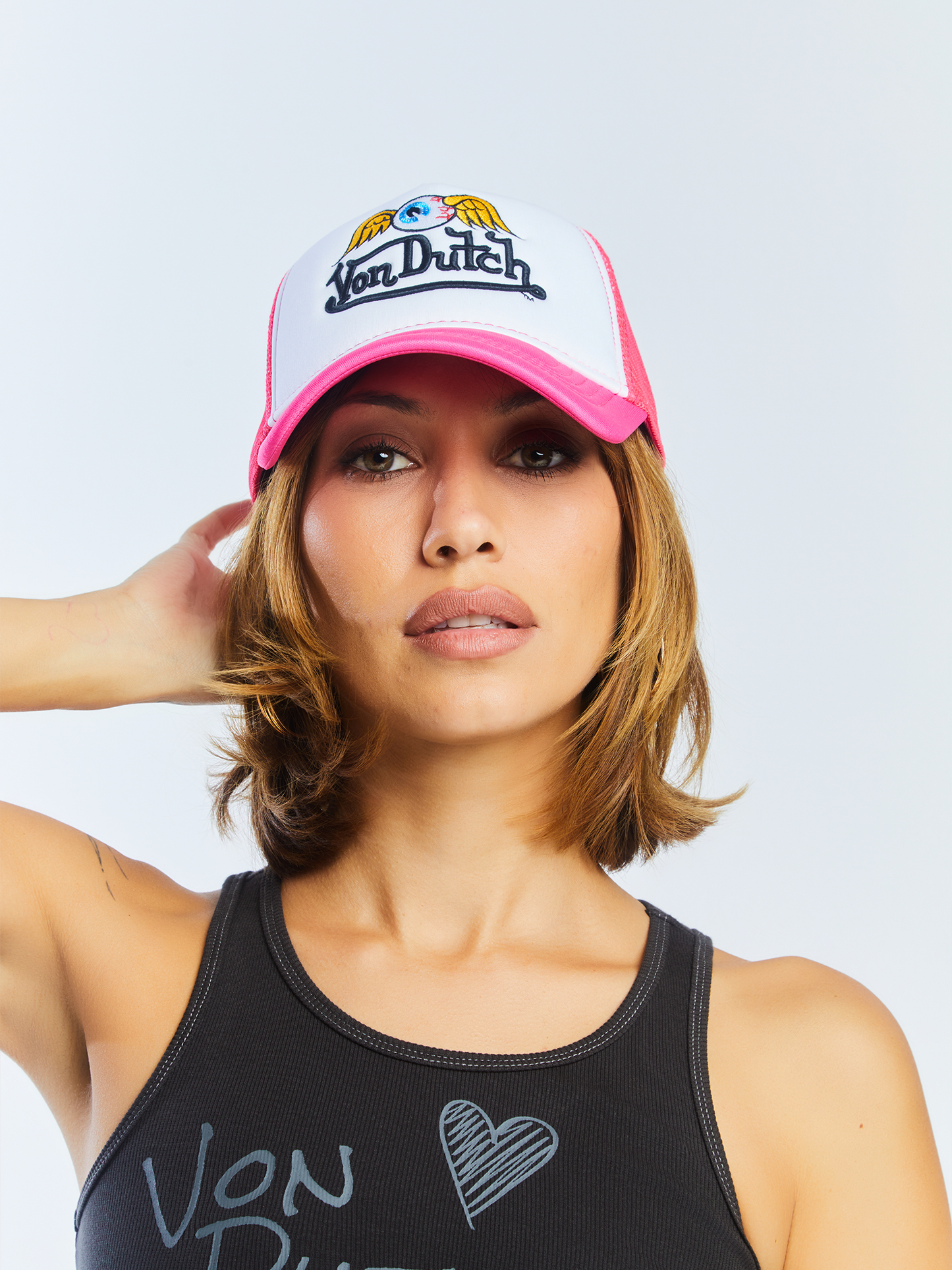 Hot Pink Flying Eyeball Wordmark Trucker Hat